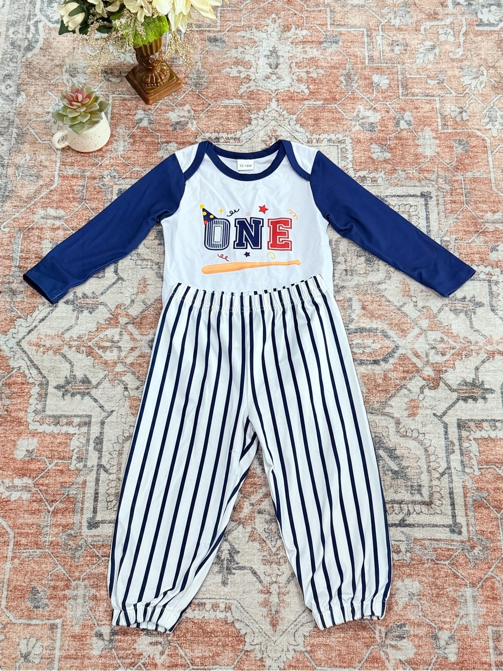 Kids' Navy & White 'One' Long-Sleeve One-Piece Romper